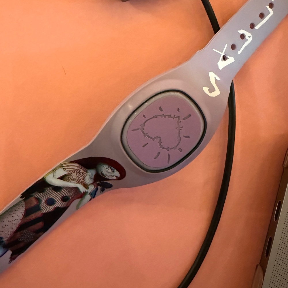 Disney Magic Band + Plus Sally Nightmare Before Christmas (with charger)